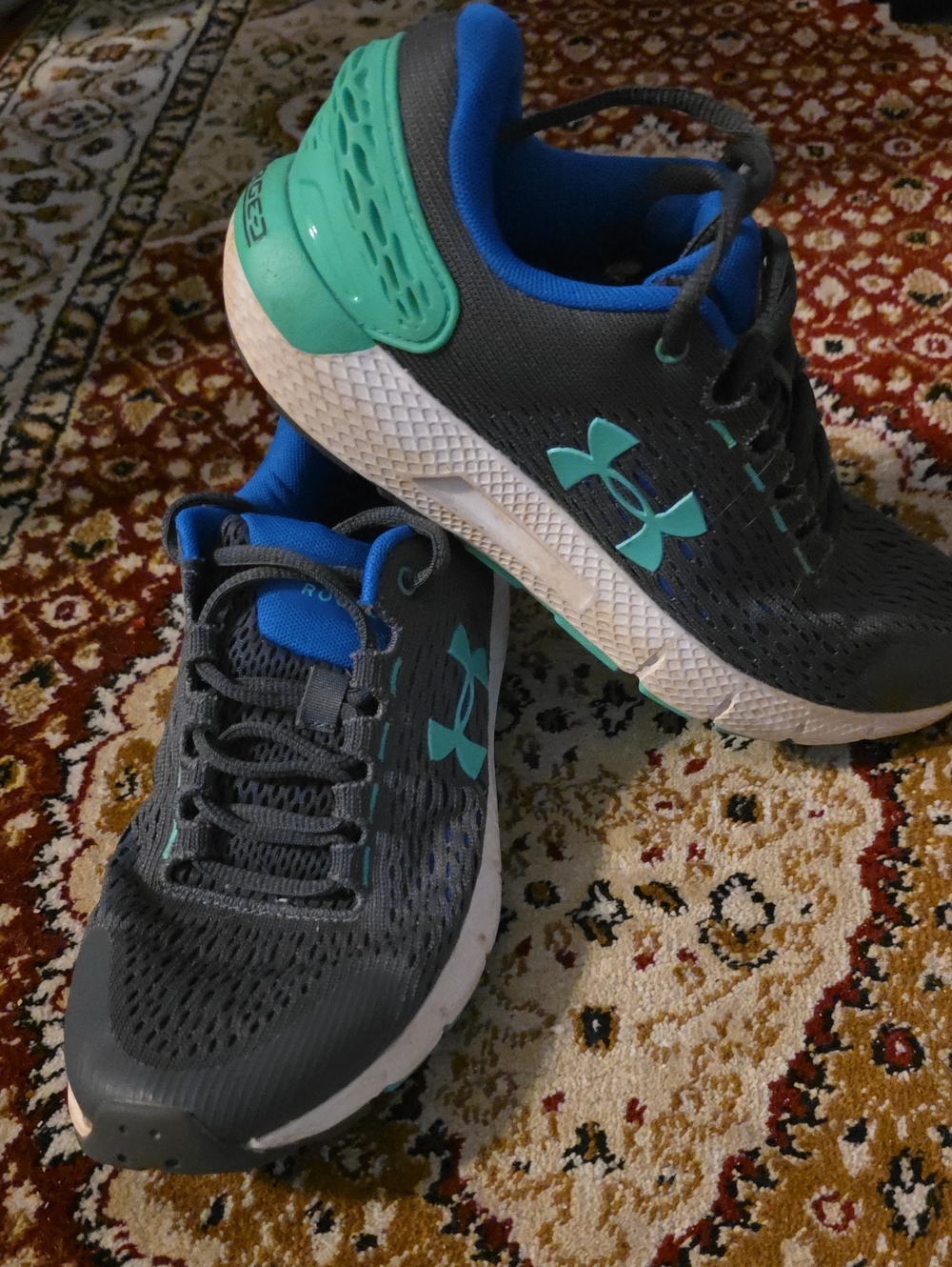Under Armour Kid’s Charcoal Athletic Shoes with Teal Accents